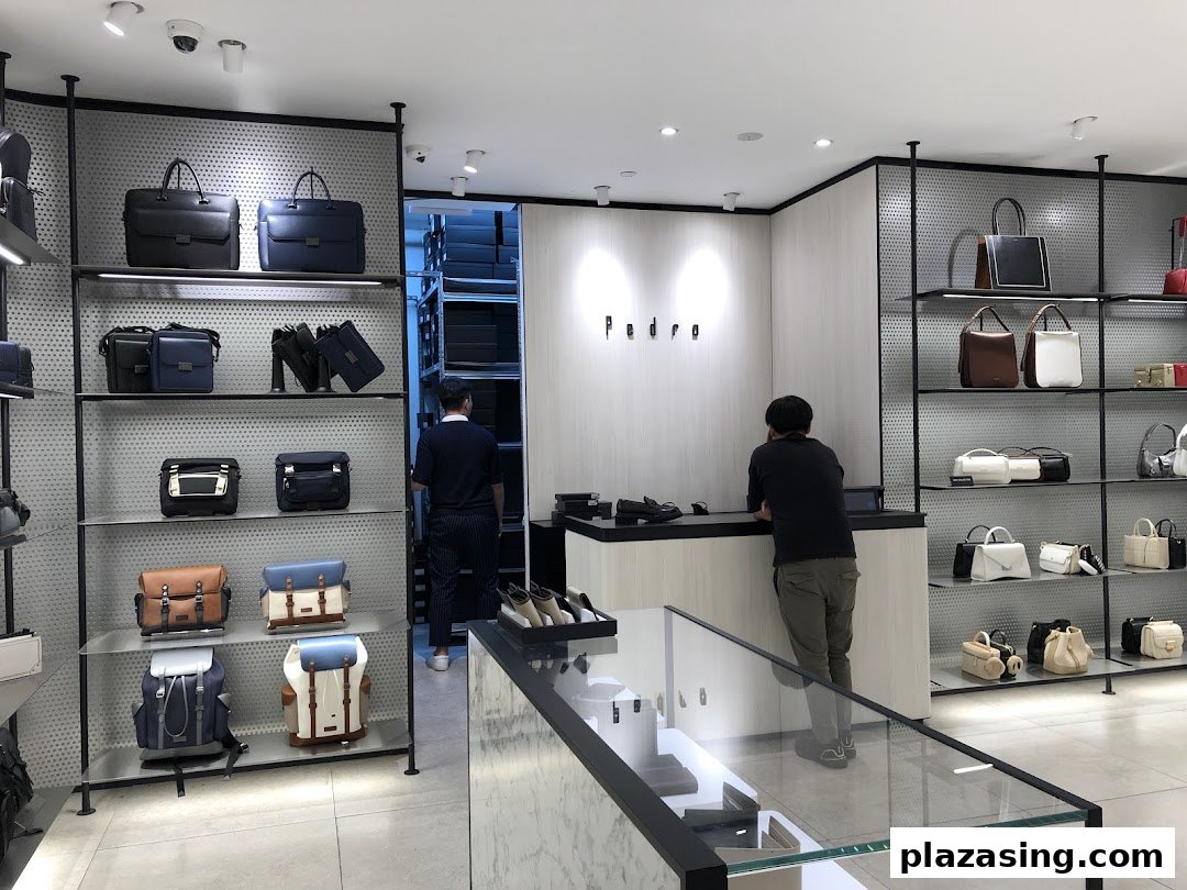 Interior view of Pedro store showcasing a wide range of stylish bags and accessories on display shelves.