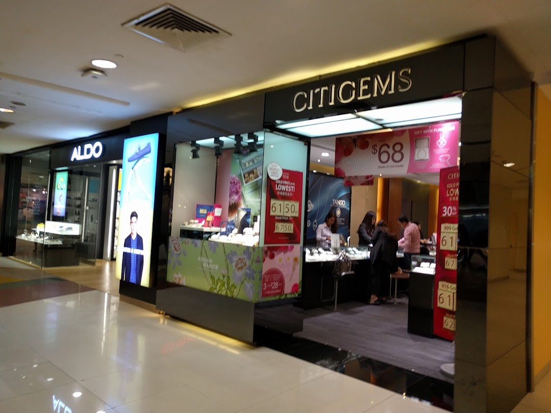 The storefront of ALDO, a fashion footwear and accessories store, with a prominent display window.