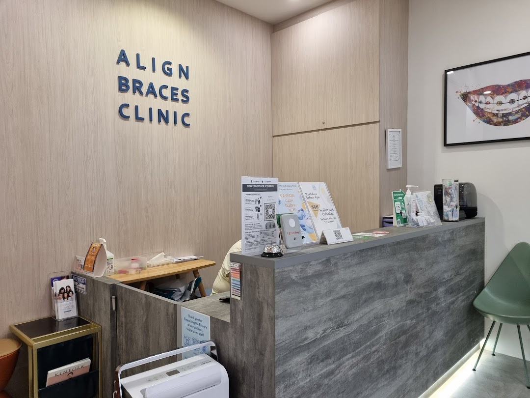 The reception area of Align Braces Clinic featuring a modern desk and clinic signage.