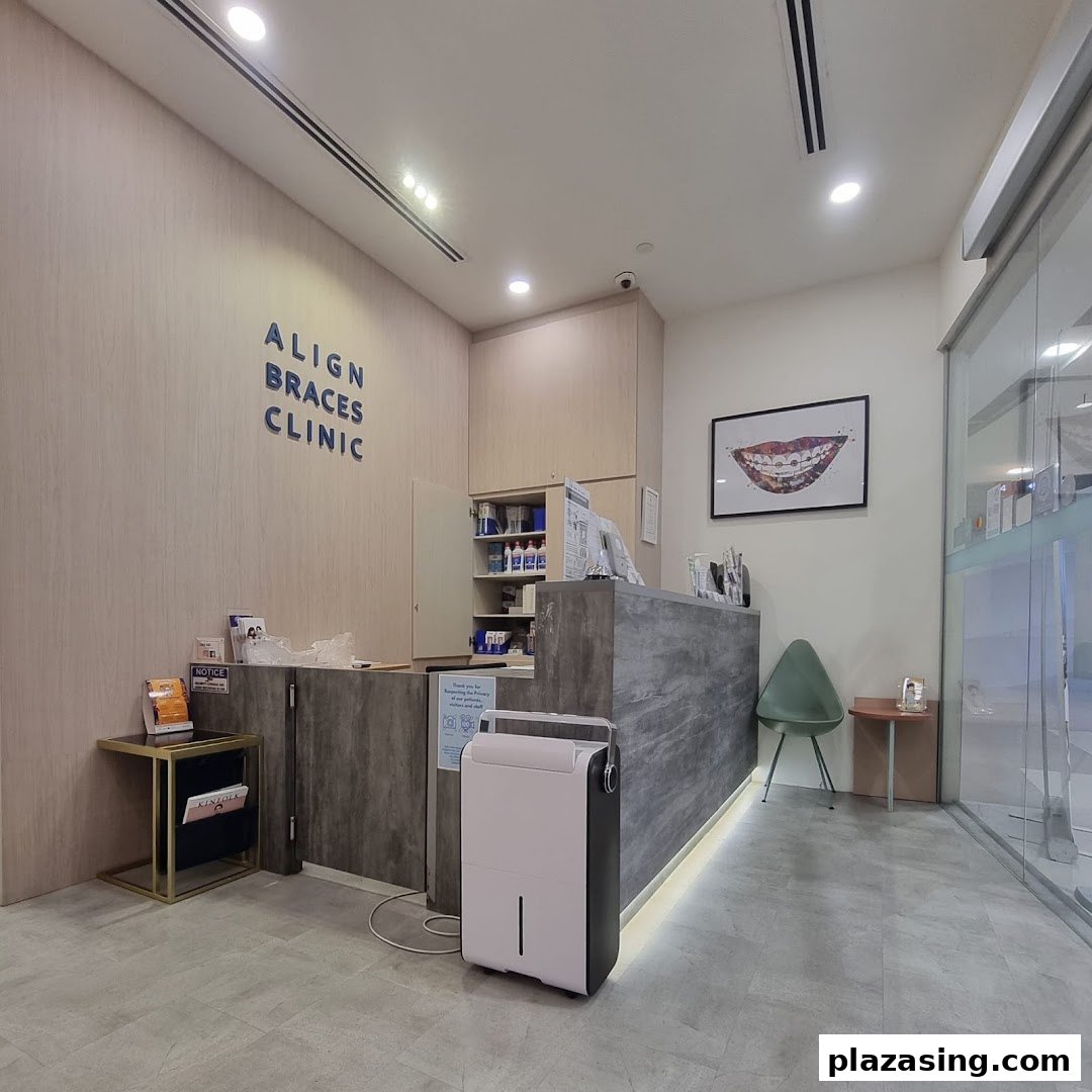 The reception area of Align Braces Clinic, featuring a modern counter, waiting space, and clinic branding.