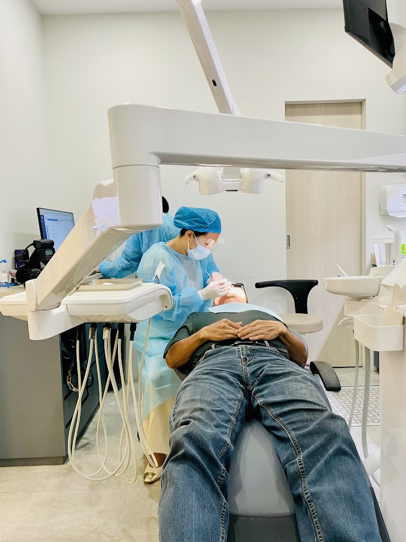 A patient receives professional dental care from a dentist at Align Braces Clinic.