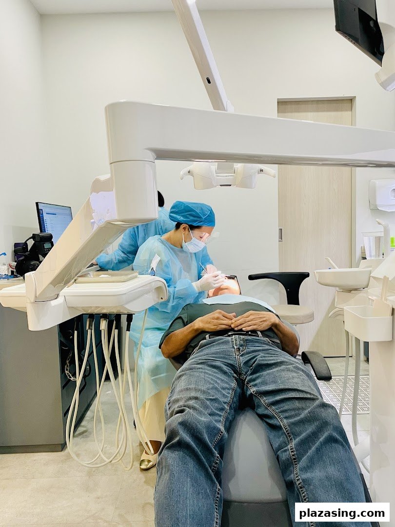 A patient receives professional dental care from a dentist at Align Braces Clinic.