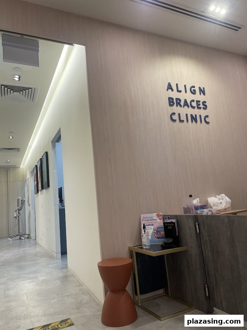 Interior view of Align Braces Clinic reception area with branding on the wall.