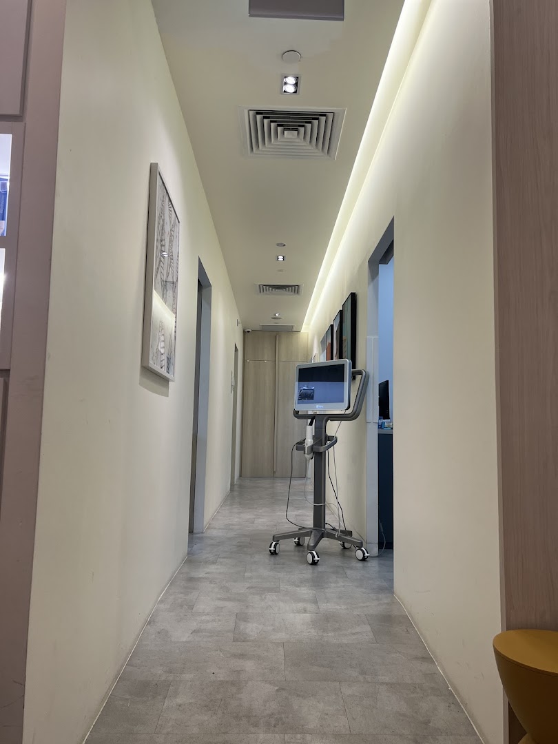 A clean, well-lit hallway inside Align Braces Clinic, featuring modern medical equipment.