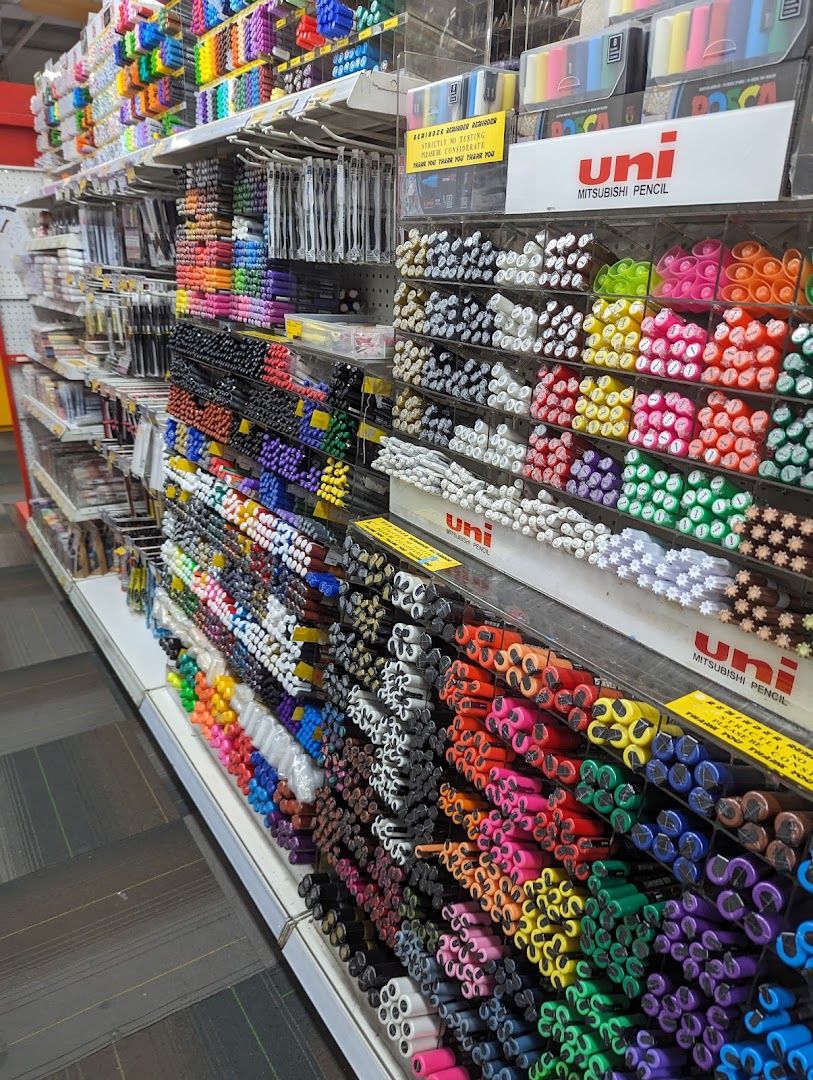Shelves brimming with a vibrant array of colorful pens and art supplies at Art Friend.