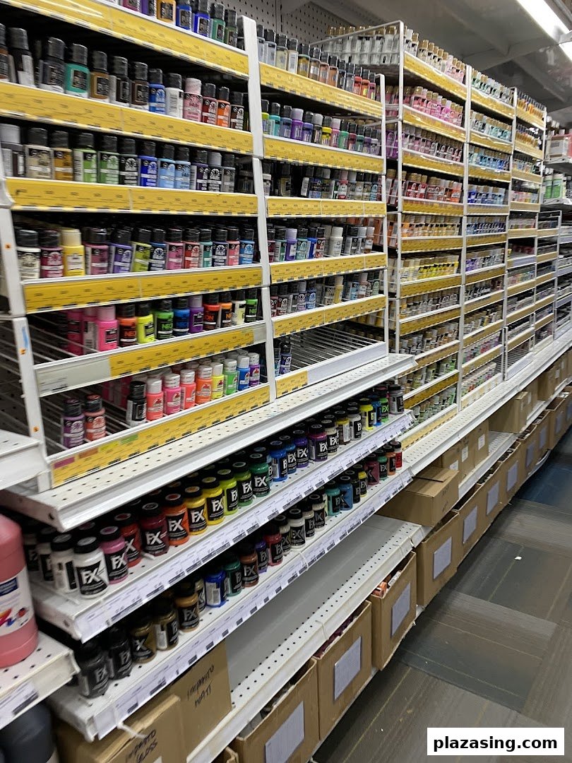 Shelves filled with a wide variety of colorful paints and art supplies at Art Friend.