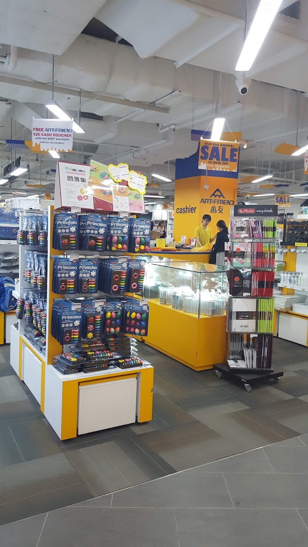 Interior view of Art Friend, featuring art supplies, stationery displays, and the cashier area.