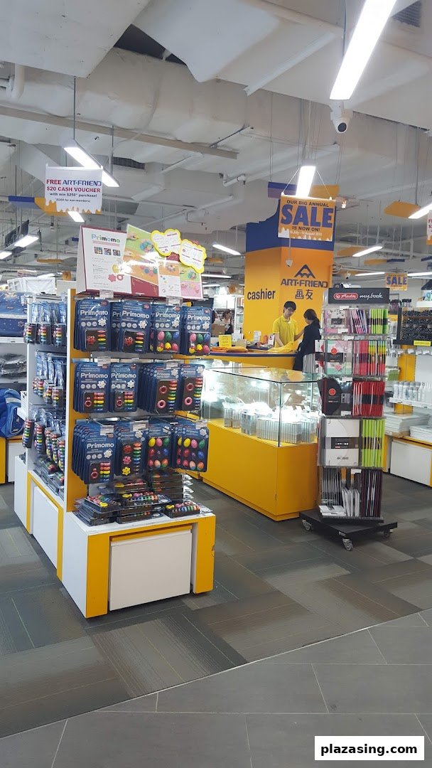 Interior view of Art Friend, featuring art supplies, stationery displays, and the cashier area.