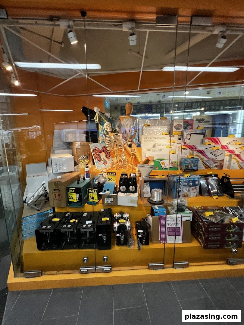 A vibrant display window at Art Friend showcasing a diverse range of art and craft supplies, including models and tools.