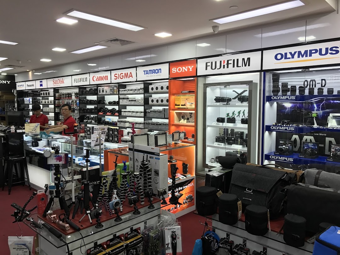 Interior view of Bally Photo Electronics, showcasing a wide range of cameras, lenses, and photography accessories.