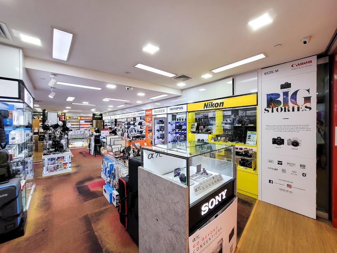 An interior view of Bally Photo Electronics, showcasing a wide range of cameras and electronic equipment.