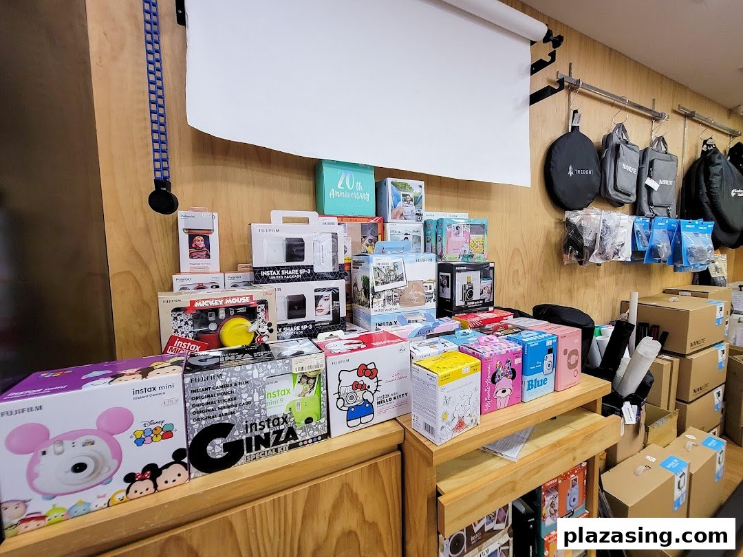 A vibrant display of instant cameras, accessories, and photography gear at Bally Photo Electronics.