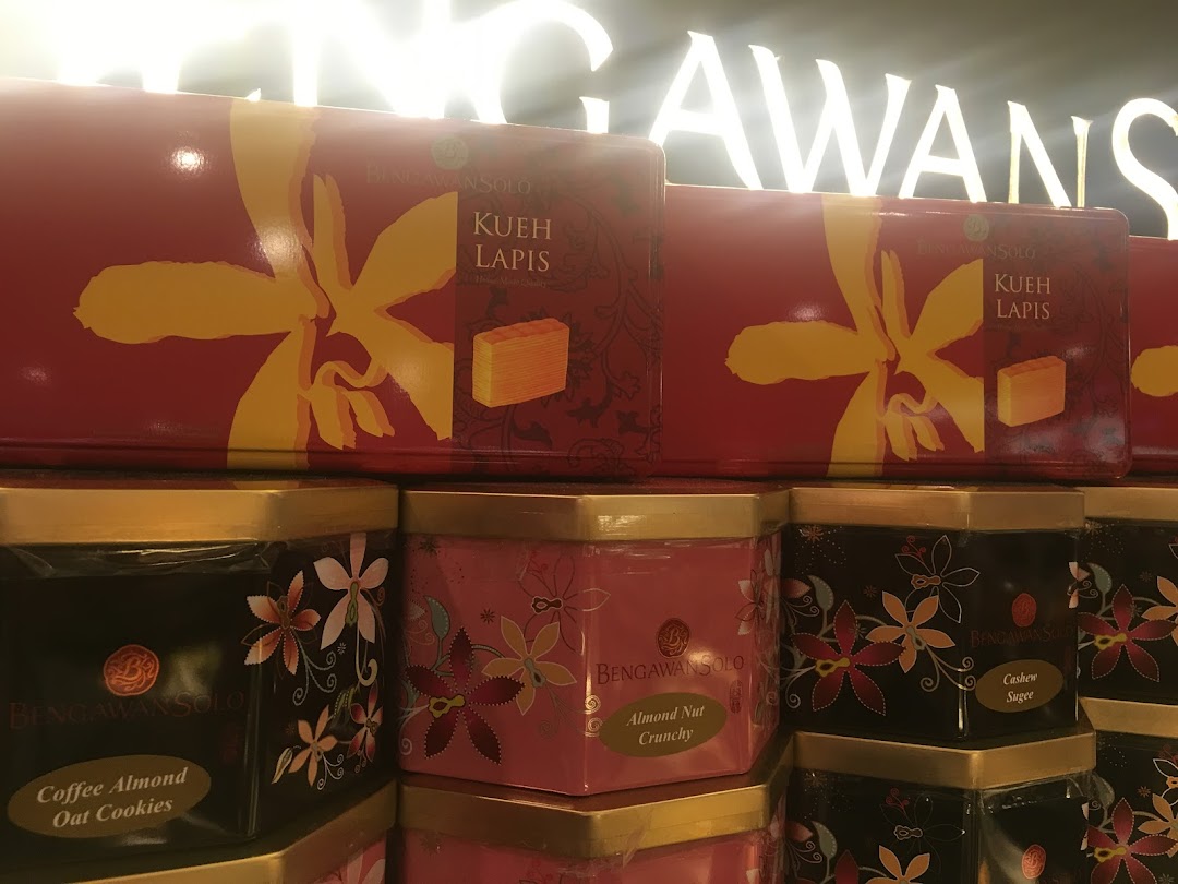 Close-up of Bengawan Solo's traditional Indonesian kueh lapis and cookie products in decorative packaging.