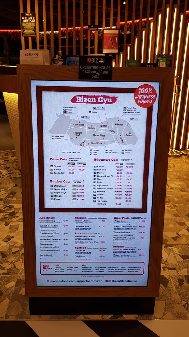 A digital menu board displaying various wagyu beef cuts, appetizers, and other dishes from Bizen Wagyu.