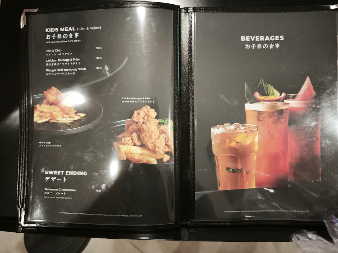 A two-page menu displaying kids' meals, desserts, and beverages with appealing food photography.