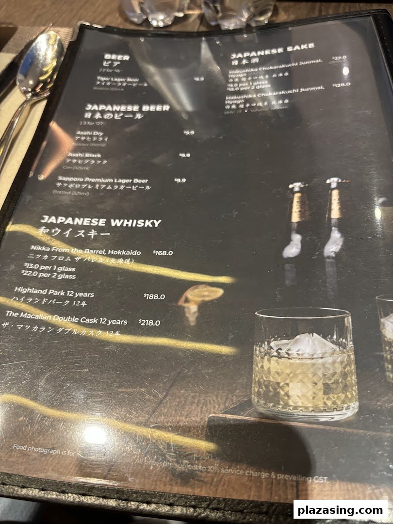 A detailed menu showcasing a selection of Japanese beers, sake, and whiskies.