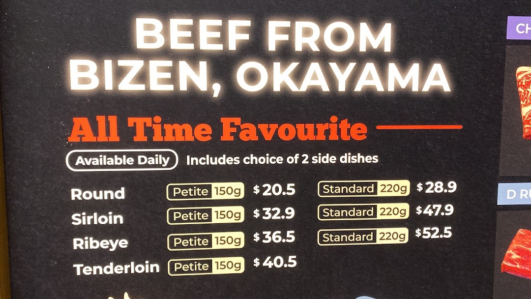 A menu board displaying beef cuts from Bizen, Okayama, with prices and weights.