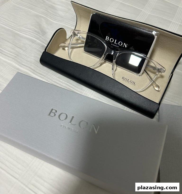 Bolon Eyewear glasses, case, and box, showcasing the brand's clear frame design.