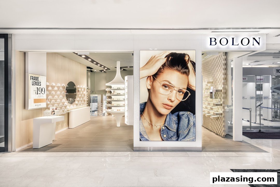 The modern shopfront of Bolon Eyewear, featuring a large model display and a glimpse into its stylish interior.