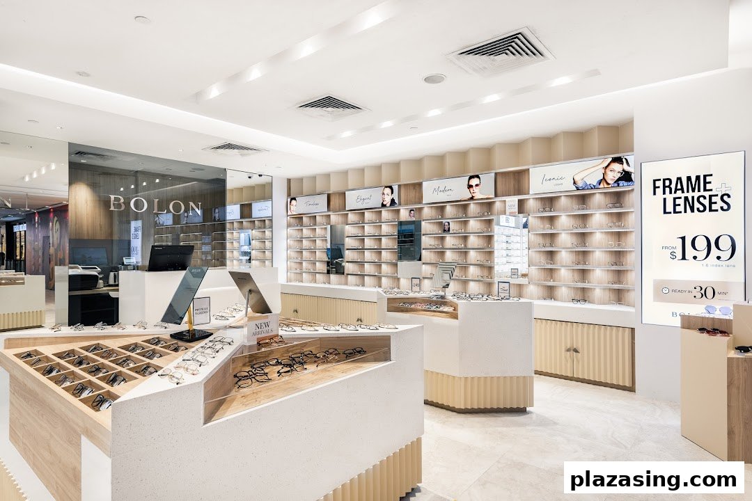 A bright and modern eyewear store interior showcasing various glasses and sunglasses displays.
