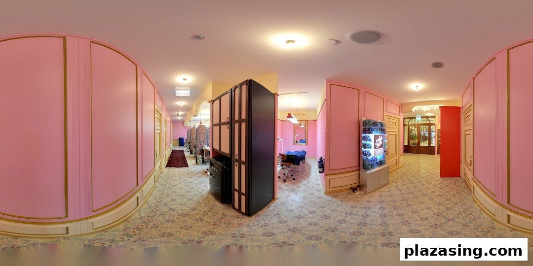 A panoramic view of Browhaus Plaza Singapura's vibrant pink interior with multiple treatment stations.