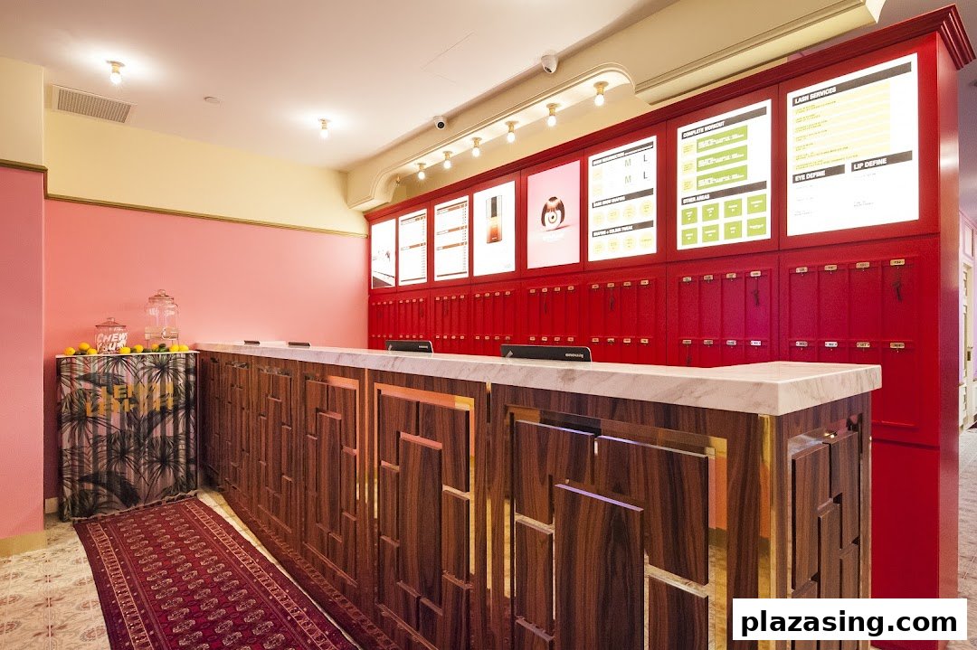 A vibrant reception area at Browhaus, featuring a stylish counter and illuminated service menus.
