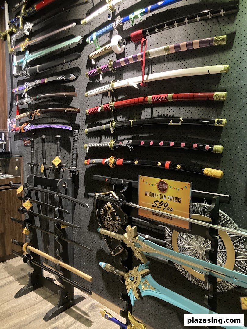 A detailed view of a retail shop wall displaying a wide array of decorative swords and katanas.