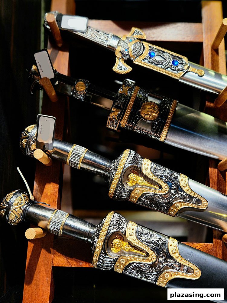 Close-up of ornate, decorative swords and daggers displayed on a wooden rack.