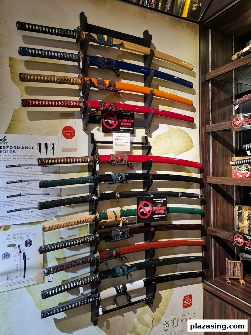 A vibrant display of various Japanese-style swords mounted on a wall, showcasing their intricate designs.