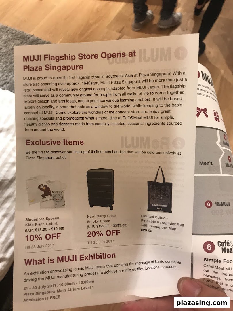 A promotional flyer announcing the grand opening of MUJI Plaza Singapura, highlighting exclusive items and the new Café&Meal MUJI.