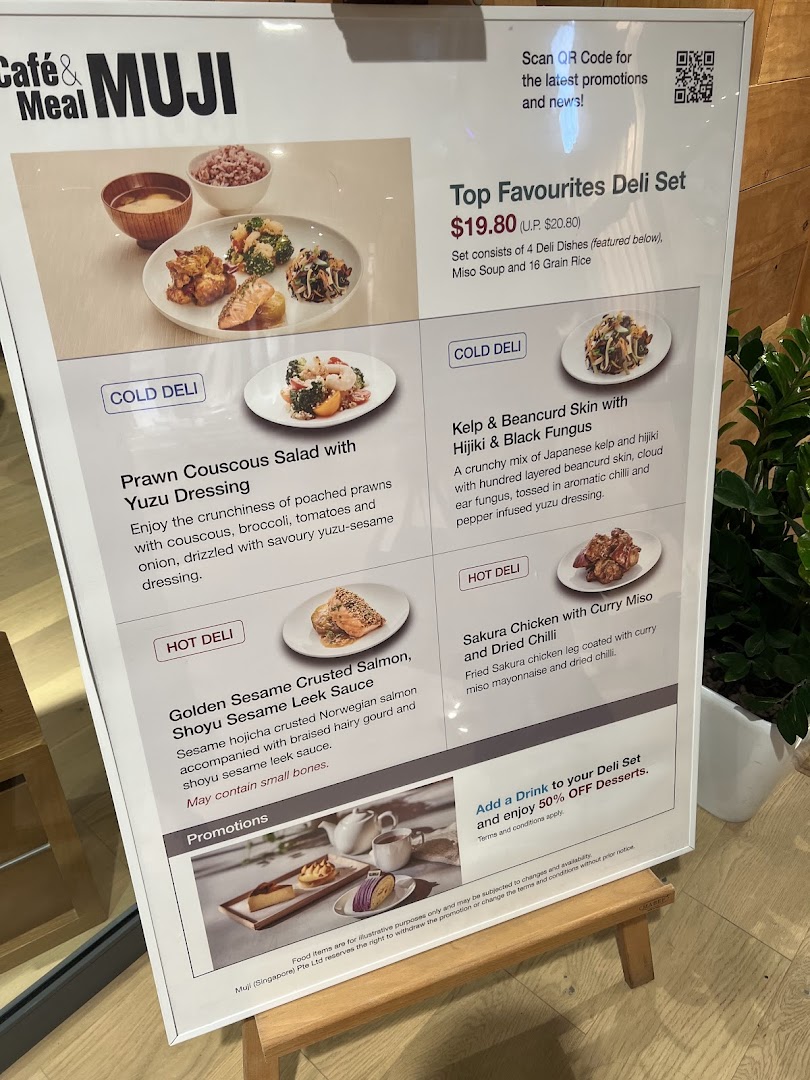 A detailed menu board for Café&Meal MUJI, showcasing deli sets, cold and hot dishes, and promotions.
