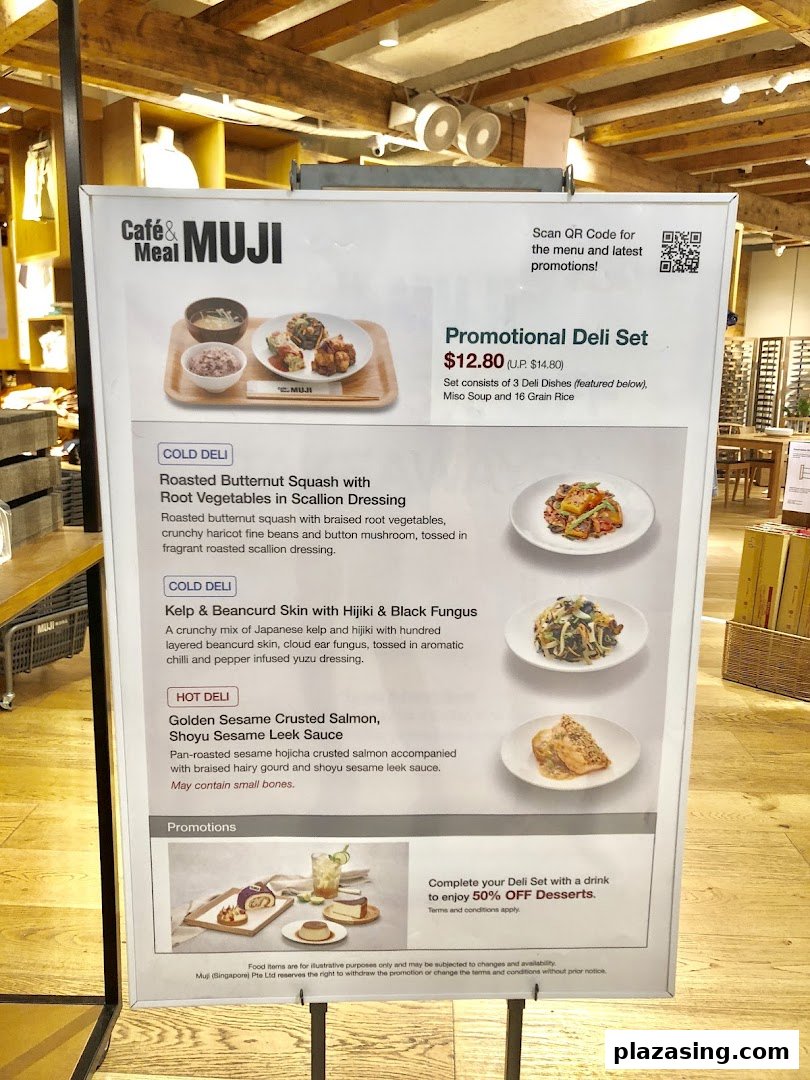 A promotional menu board for Café & Meal MUJI, featuring a deli set and individual dish descriptions.