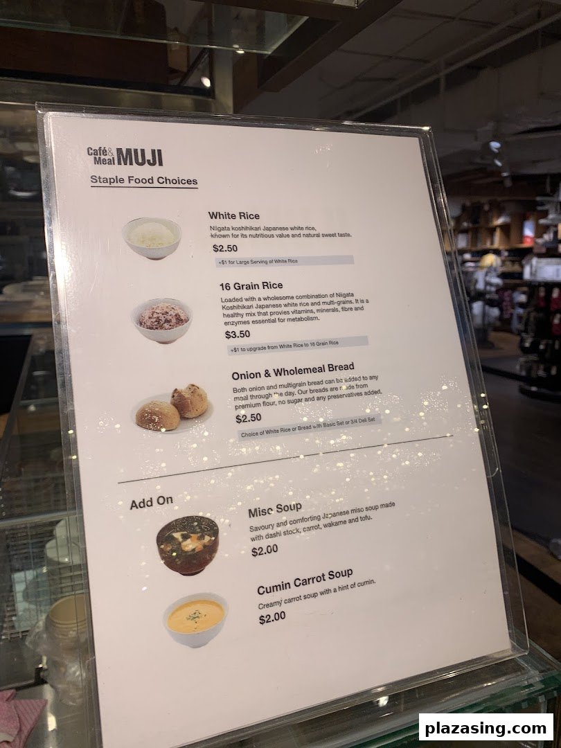 A detailed menu from CafèMeal MUJI, showcasing staple food choices and add-on soups.