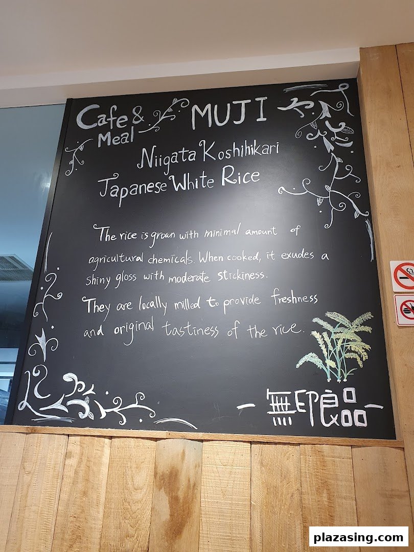 A chalkboard at Cafe&Meal MUJI describes the quality and origin of their Niigata Koshihikari Japanese White Rice.