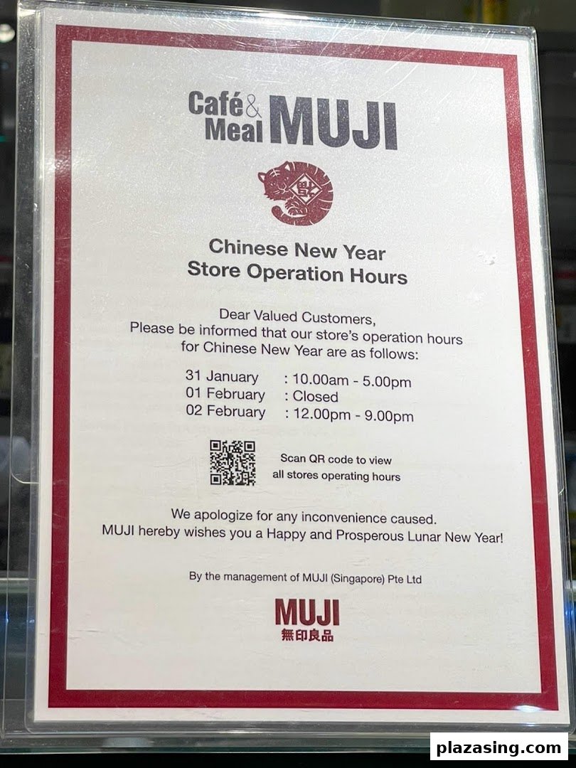A sign displaying Cafè&Meal MUJI's Chinese New Year store operation hours.
