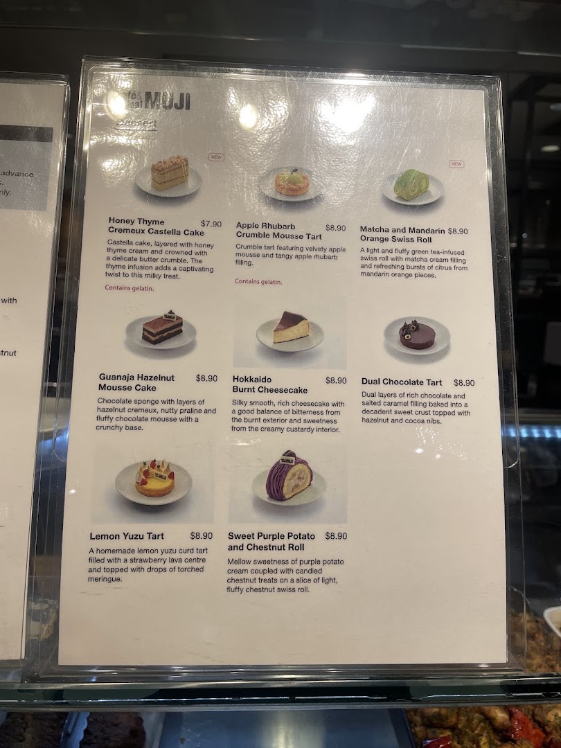 A detailed menu displaying various dessert cakes, tarts, and rolls with descriptions and prices.