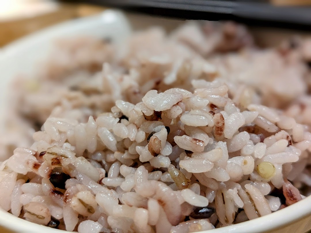 A close-up shot of a bowl of healthy, wholesome mixed grain rice.