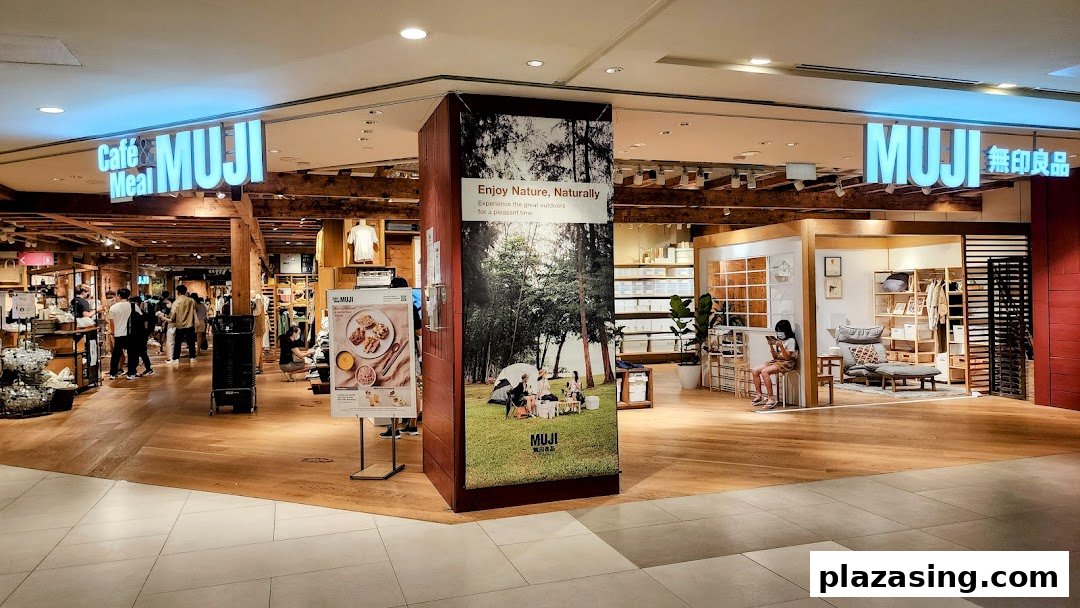 The entrance of CafèMeal and MUJI at Plaza Singapura, showcasing its minimalist interior and diverse offerings.