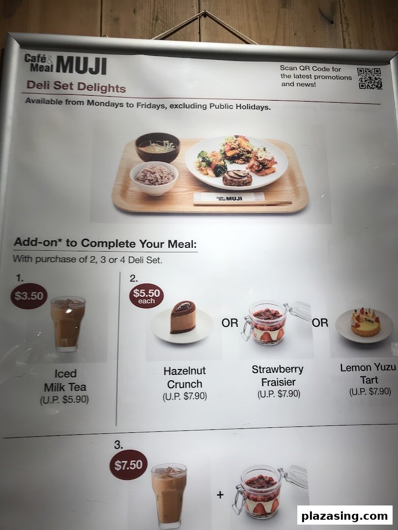 A menu board displaying Deli Set Delights and various add-on options for drinks and desserts at Café & Meal MUJI.