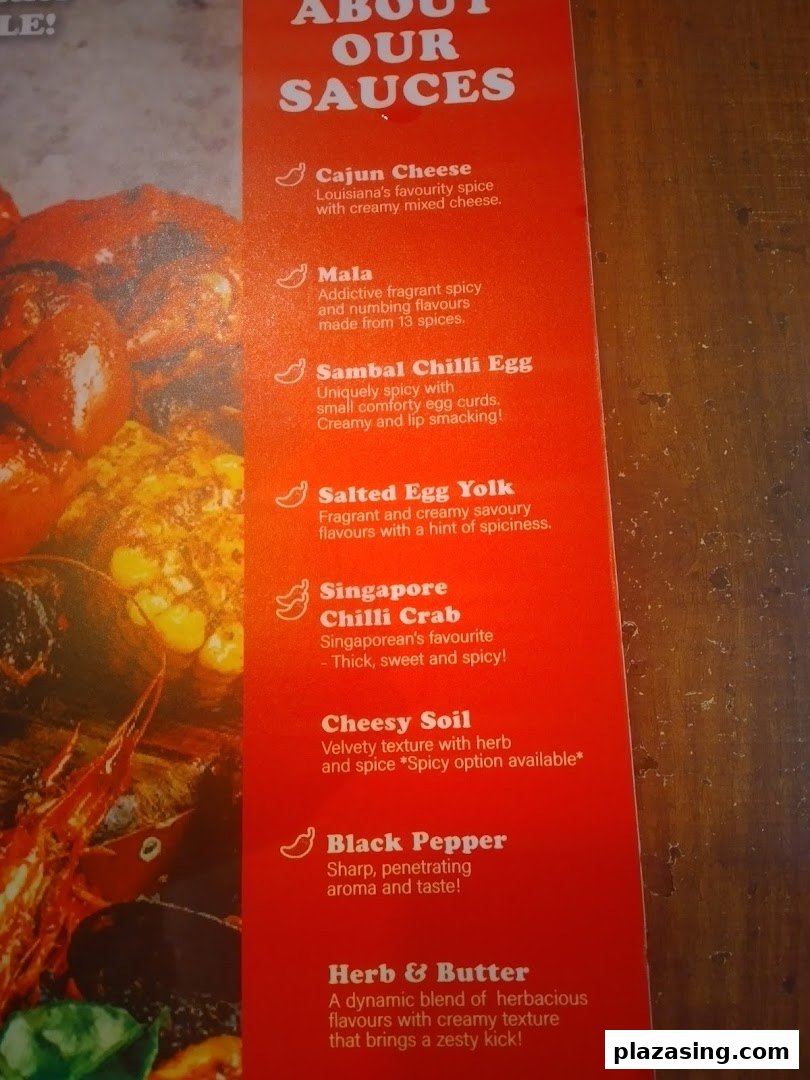 A close-up of a menu displaying various sauce options and their descriptions.
