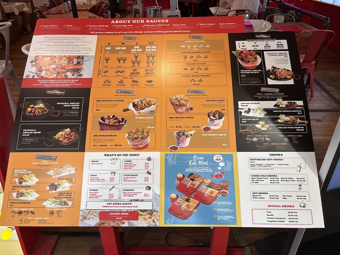 A comprehensive menu board displaying various seafood dishes, sides, and drinks from Cajun on Wheels.