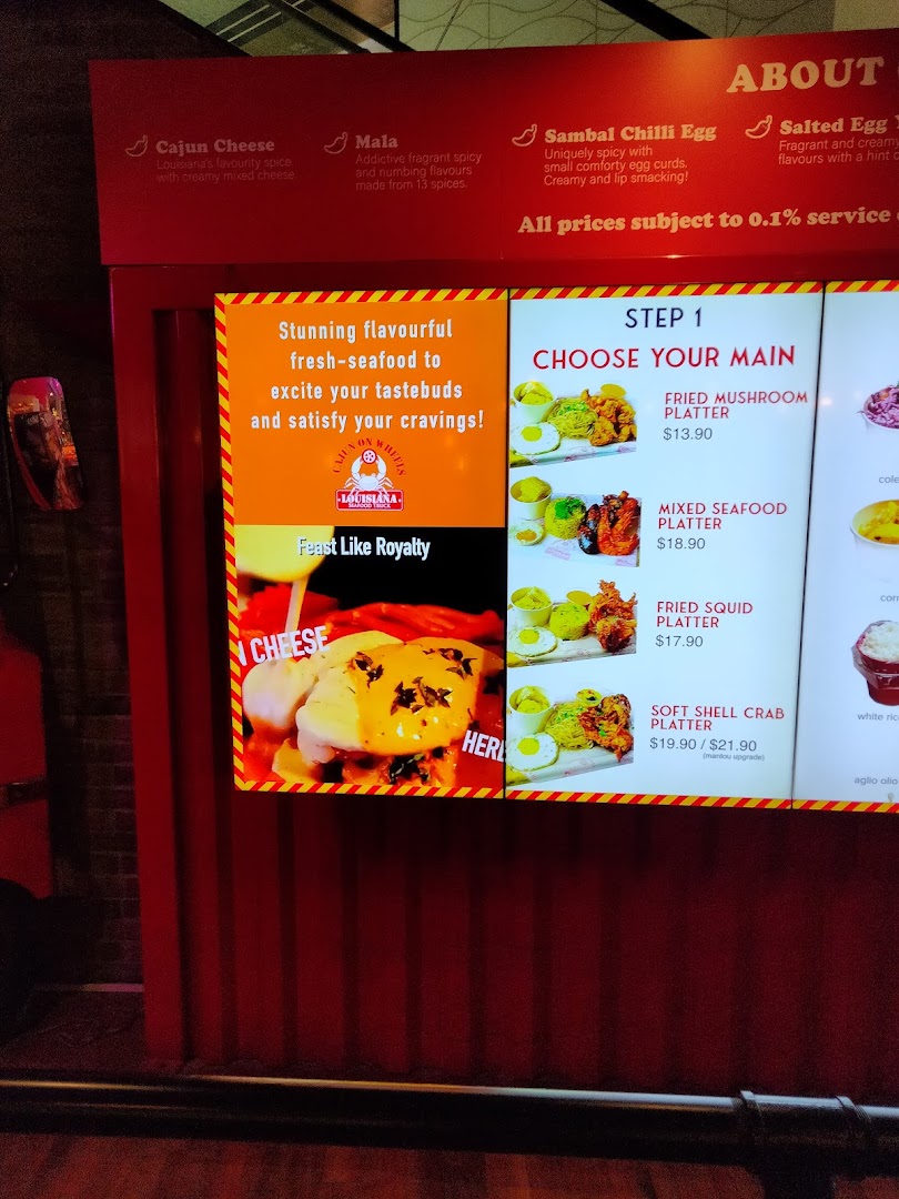 A vibrant menu board for Cajun on Wheels, displaying seafood platters and flavor options.