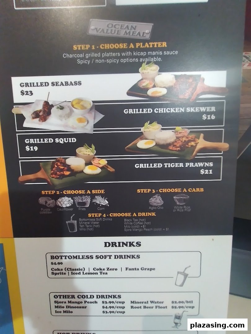 A detailed menu board displaying grilled seafood and chicken platters, sides, carbs, and various drink options.