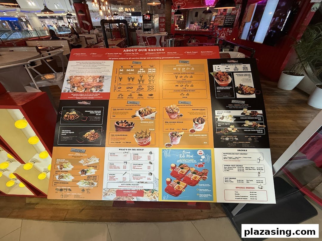 A large, detailed menu board for Cajun on Wheels, showcasing a variety of seafood buckets, grilled items, sides, and drinks.