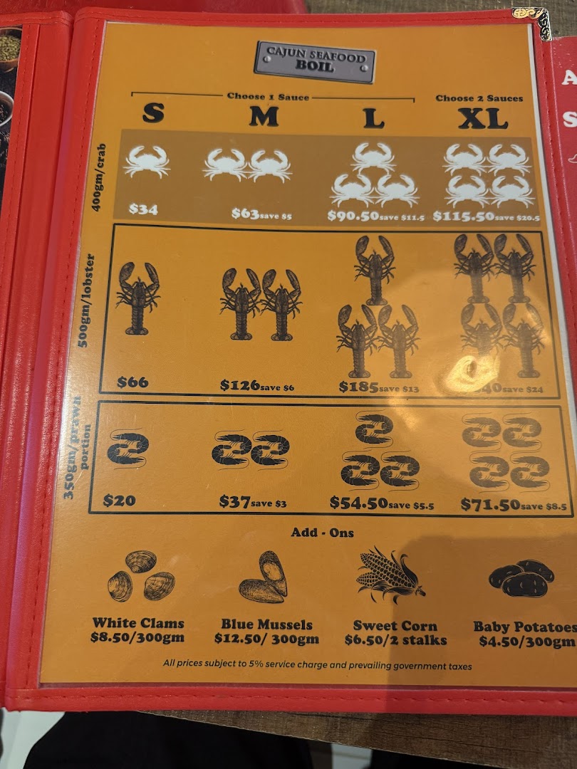 A detailed menu displaying seafood boil options with prices and add-ons.