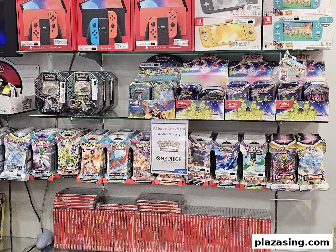 Shelves stocked with Nintendo Switch consoles, Pokémon TCG products, and video games at Challenger.