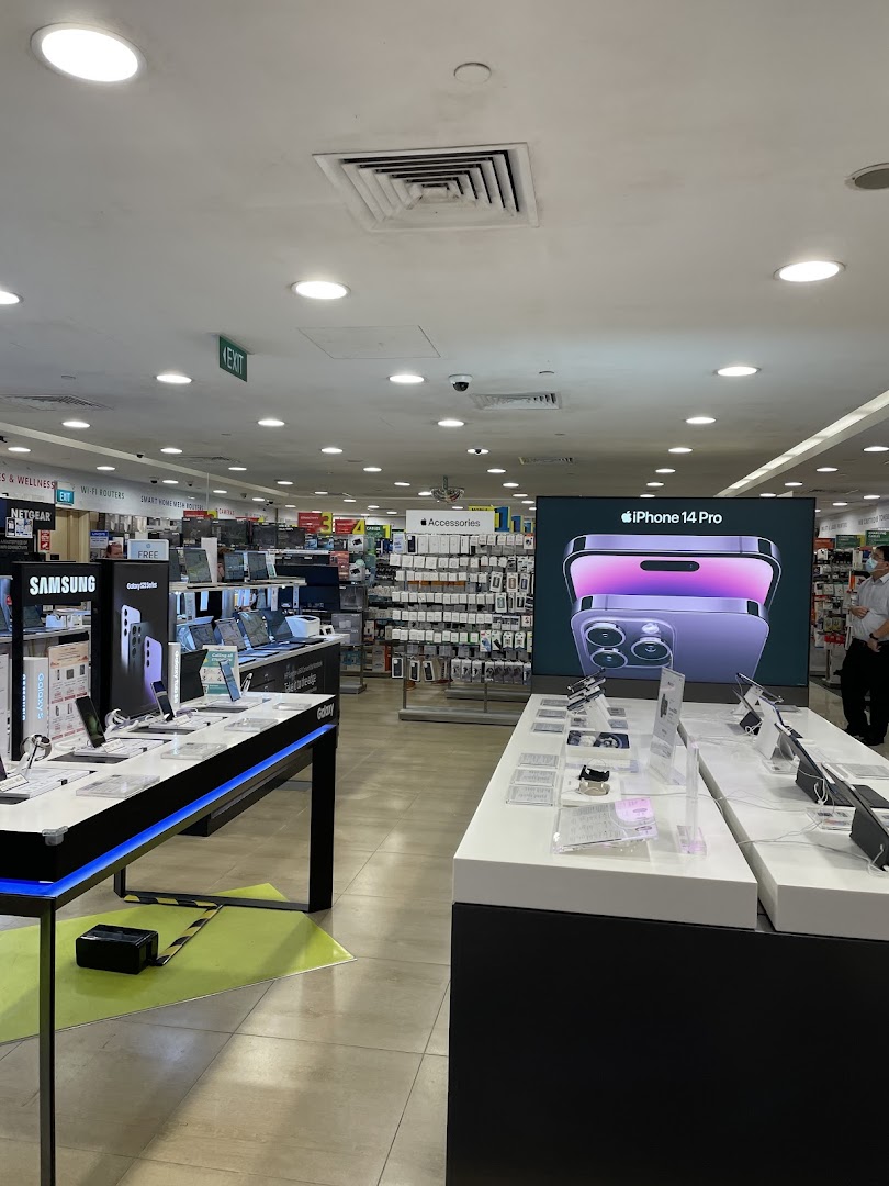 Interior view of Challenger electronics store showcasing various tech products and accessories.