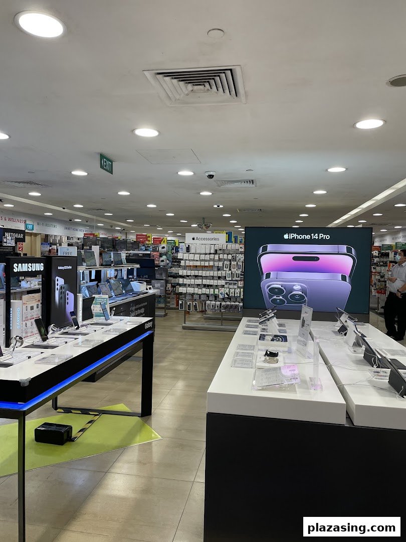 Interior view of Challenger electronics store showcasing various tech products and accessories.