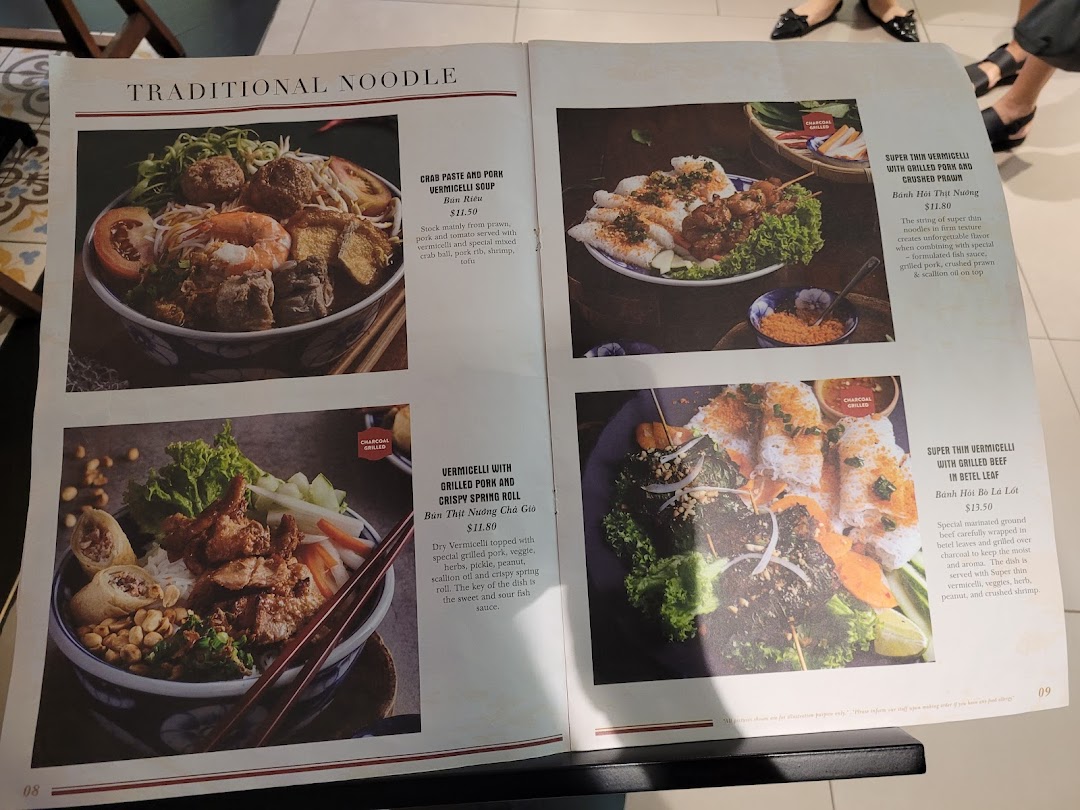 A vibrant menu page showcasing traditional Vietnamese noodle and vermicelli dishes with enticing photos.