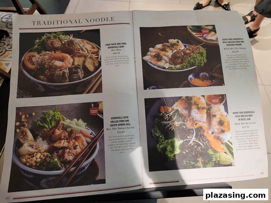 A vibrant menu page showcasing traditional Vietnamese noodle and vermicelli dishes with enticing photos.